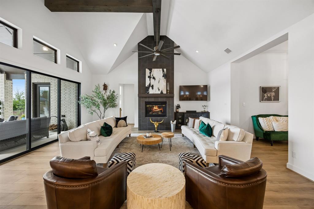 1908 Lotus Court Haslet, TX 76052 - Photo 10 of 40 Dramatic Fireplace And Cedar Beams Elevate The Main Living Spaces