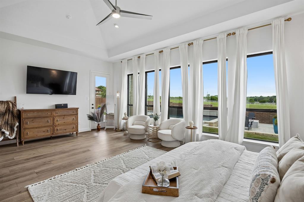 1908 Lotus Court Haslet, TX 76052 - Photo 18 of 40 Luxurious Primary Suite Featuring Private Backyard Access