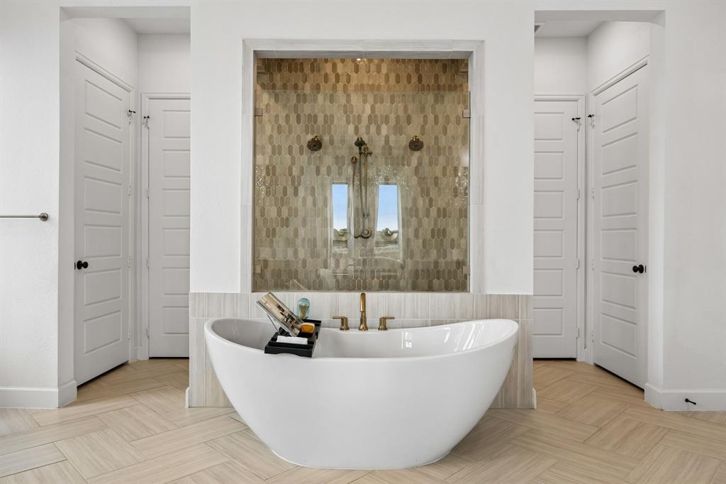 1908 Lotus Court Haslet, TX 76052 - Photo 19 of 40 Spa-like Primary Bath Featuring Freestanding Tub And Expansive Walk-In Shower