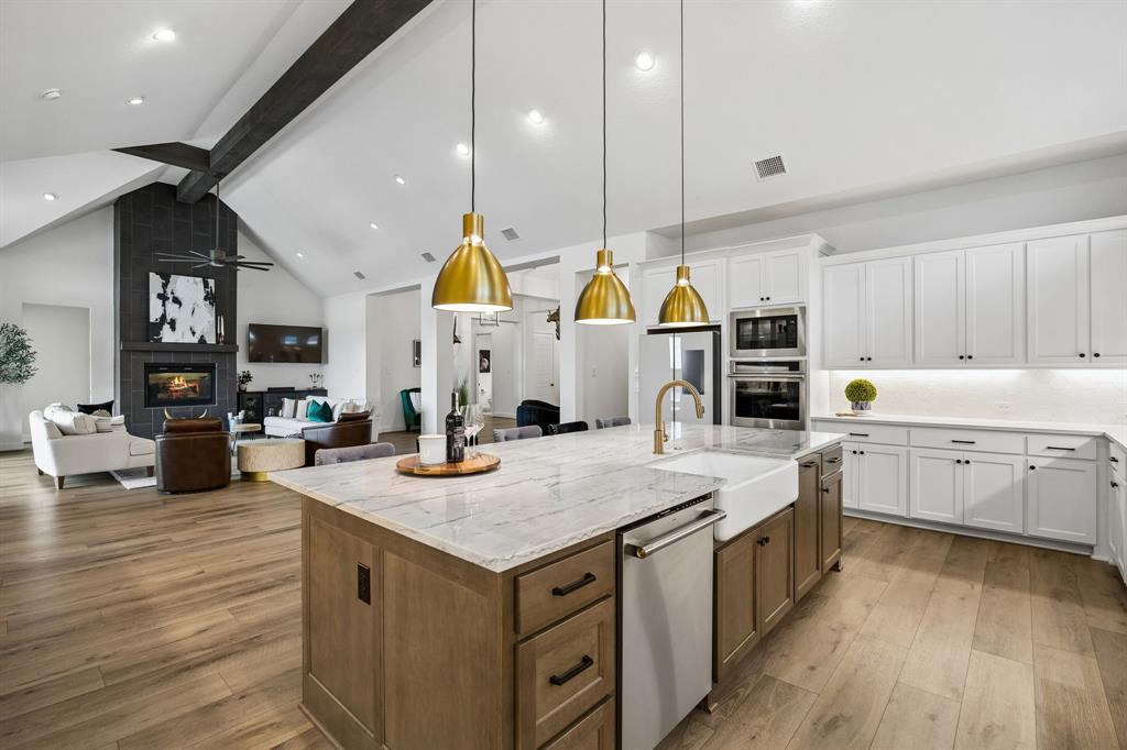 1908 Lotus Court Haslet, TX 76052 - Photo 40 of 40 Elegant Open Floorplan Featuring High Ceilings, Pendant Lighting, and Seamless Flow