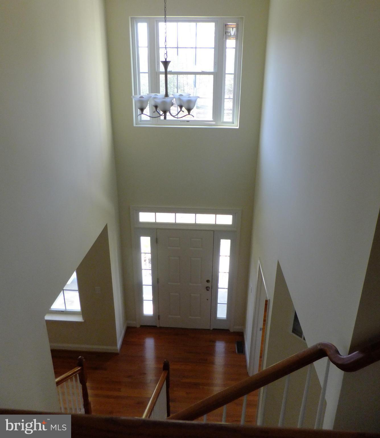 4698 Mountain Road Pasadena, MD 21122 - Photo 5 of 27 GRAND FOYER / HARDWOOD