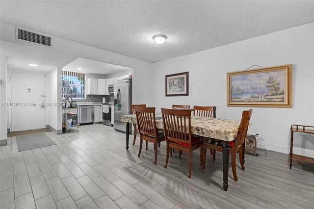 front view of a building with a yard