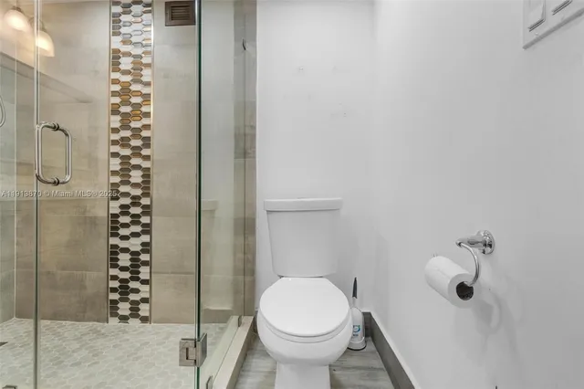 an aerial view of a house with a garden