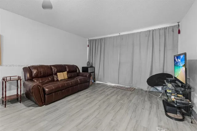 a view of a building with a yard