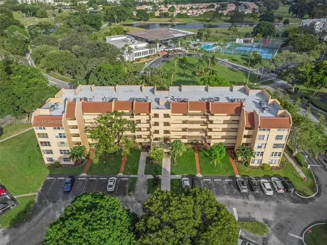a bedroom with bed and a desk