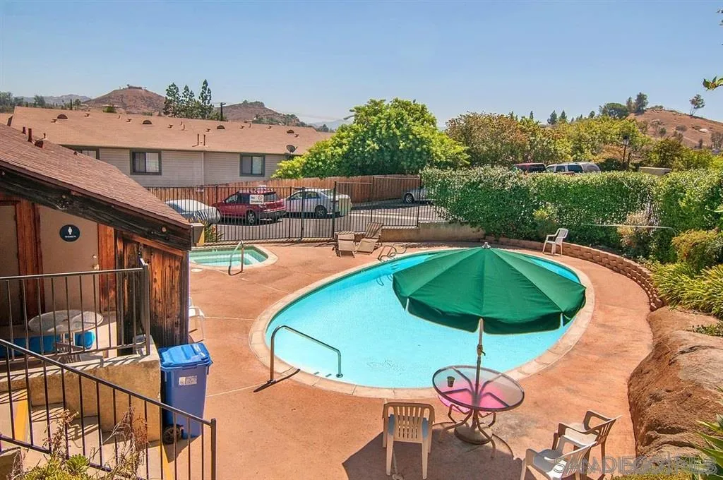 1673 Stone Edge Circle El Cajon, CA 92021 - Photo 19 of 20 an outdoor space with furniture and umbrella