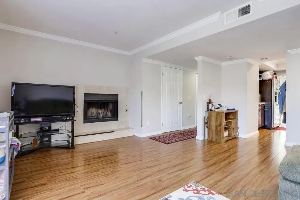 1673 Stone Edge Circle El Cajon, CA 92021 - Photo 5 of 20 a living room with furniture and a flat screen tv