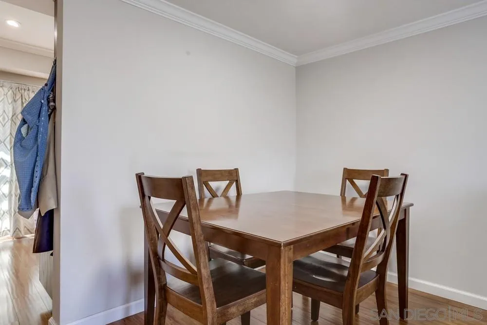 1673 Stone Edge Circle El Cajon, CA 92021 - Photo 6 of 20 a view of a dining room that has a table and chairs