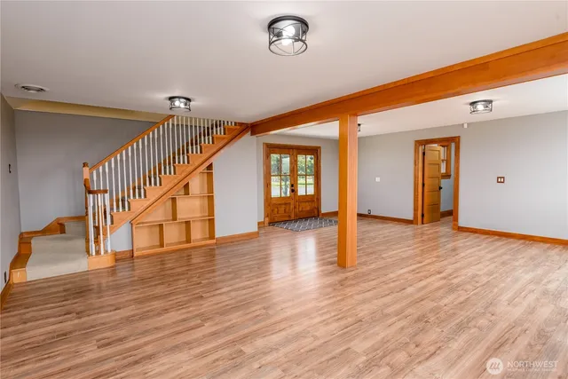 an empty room with windows