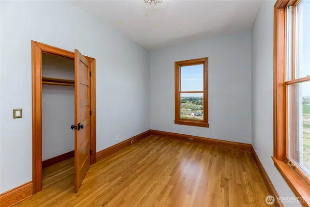 a view of a storage & utility room with a window
