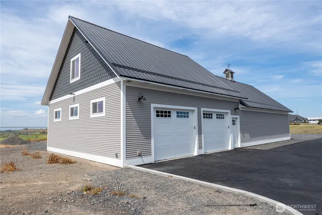 a view of a house with a garage
