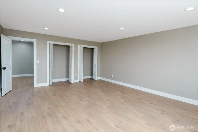 a bathroom with a sink toilet and a mirror