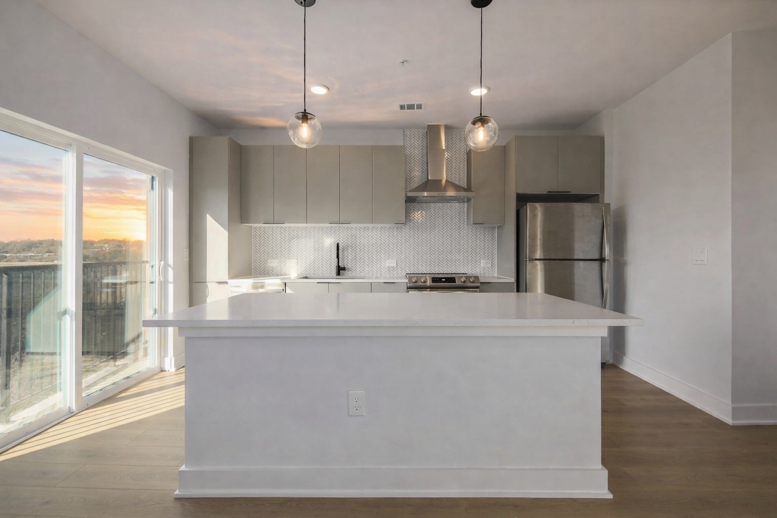 2500 Longview Street, Unit 501 Austin, TX 78705 - Photo 2 of 21 a large kitchen with kitchen island a large counter space a sink appliances and a large window