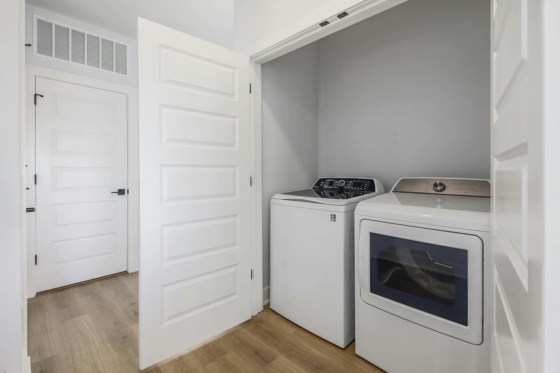 2500 Longview Street, Unit 501 Austin, TX 78705 - Photo 9 of 21 a utility room with dryer and washer