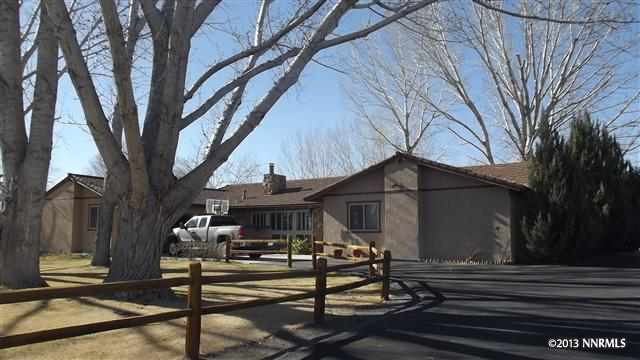 3022 Bottom Road Fallon, NV 89406 - Photo 1 of 1 a front view of a house with a garden