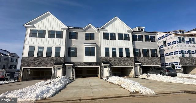 a view of a building with a yard in the house