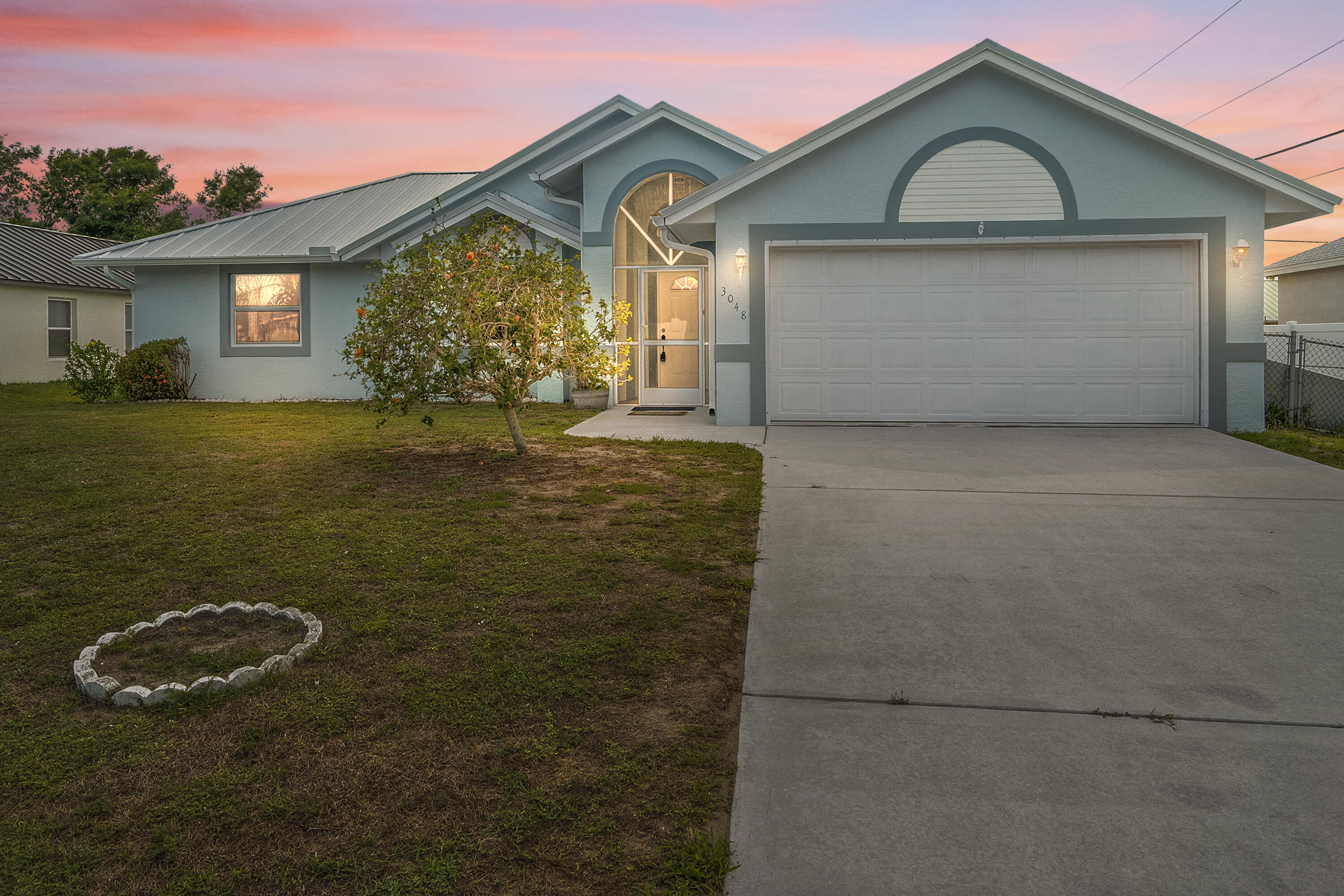 3048 Southeast Wake Road Port St. Lucie, FL 34984 - Photo 1 of 31 Front