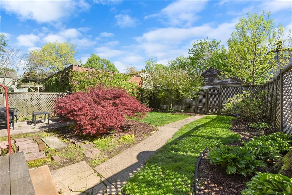 7723 Edgerton Avenue Pittsburgh, PA 15221 - Photo 22 of 25 a view of a garden with a pathway