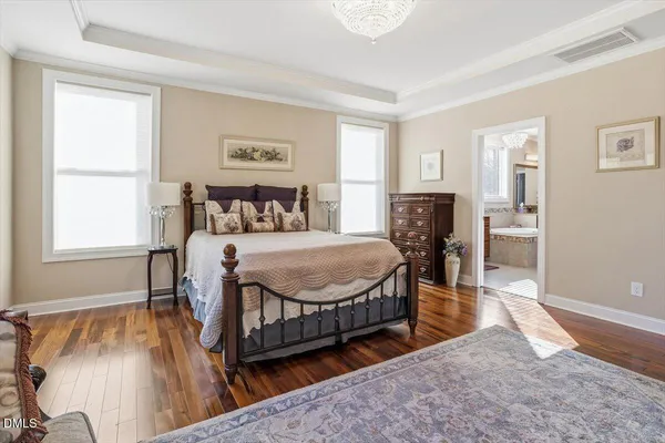 a bedroom with a bed furniture and a window