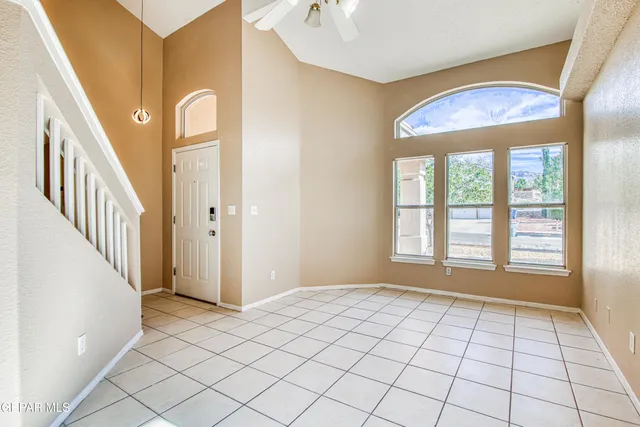 a kitchen with stainless steel appliances granite countertop a stove sink and cabinets