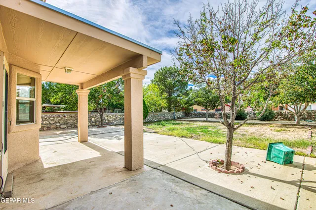 a view of a city with a building in the background