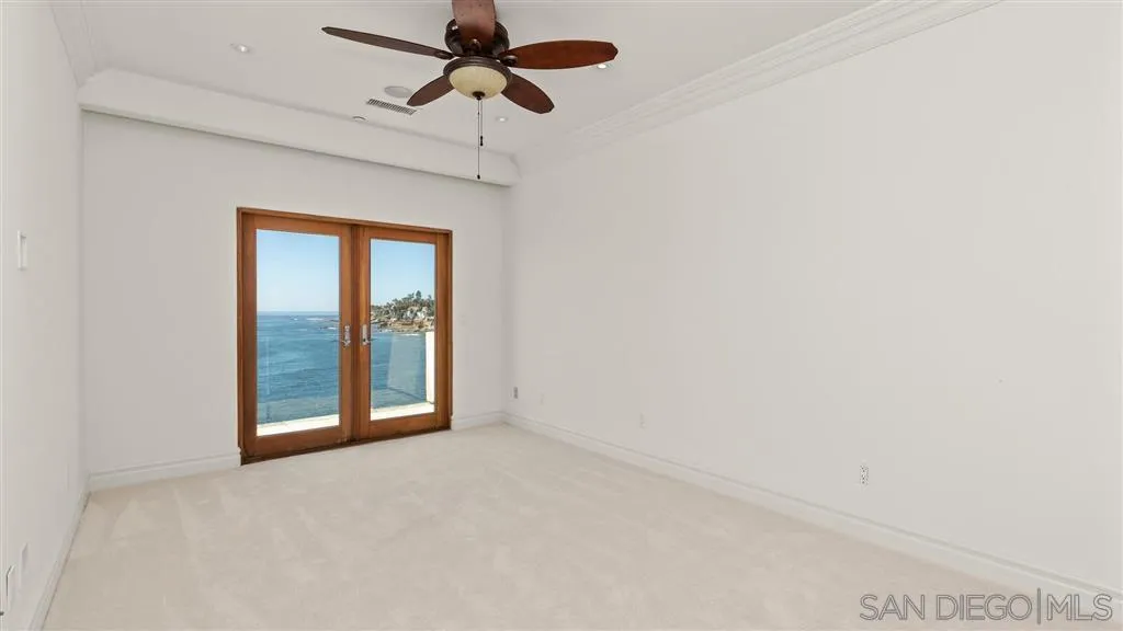 5730 Dolphin Place La Jolla, CA 92037 - Photo 14 of 19 a view of an empty room with a window