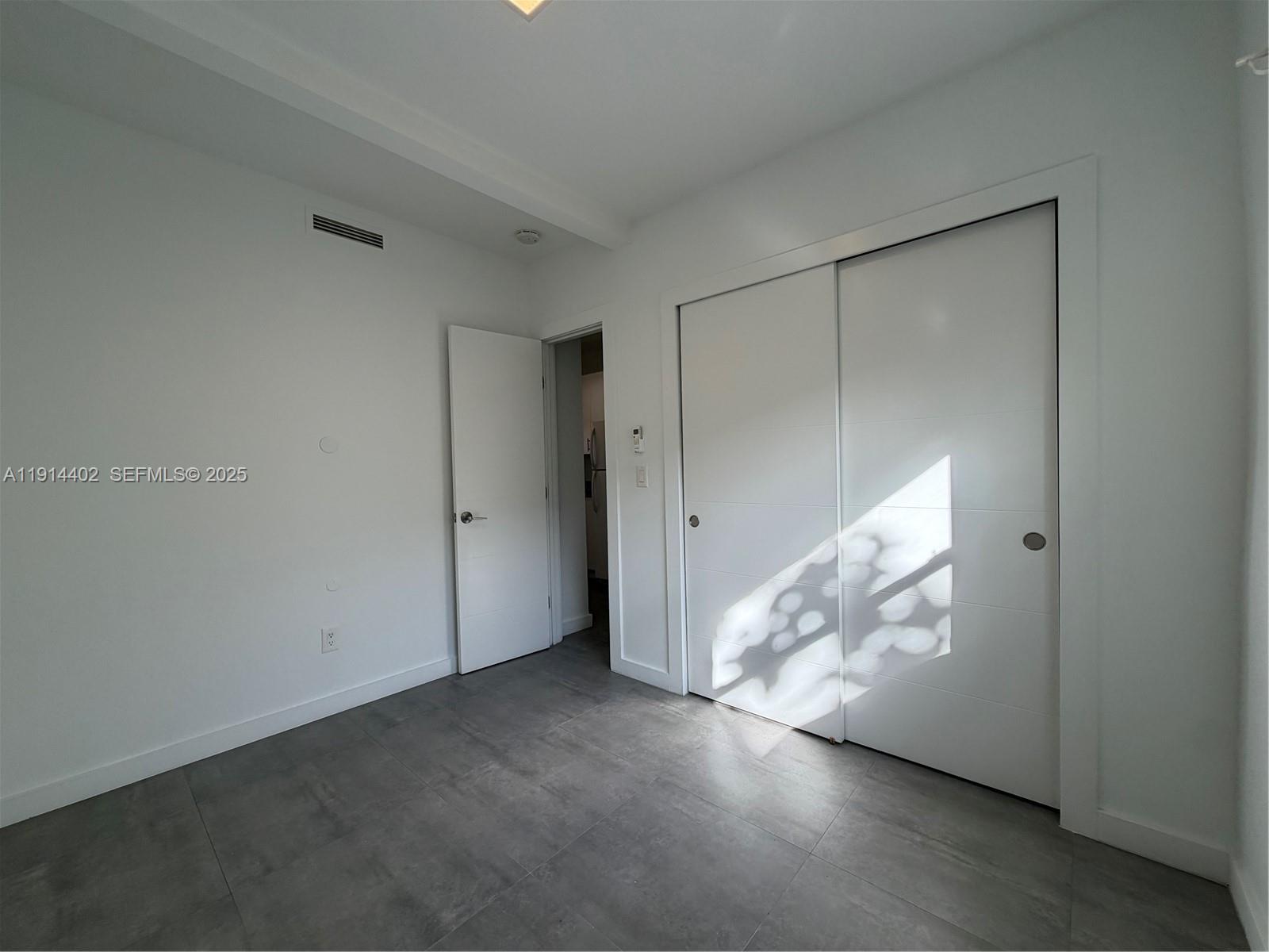 3051 Southwest 27th Lane, Unit 3 Miami, FL 33133 - Photo 8 of 8 a view of empty room