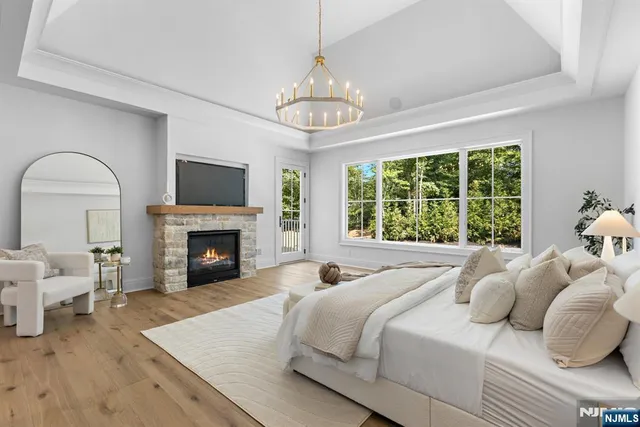 a bed room with a bed and a fireplace