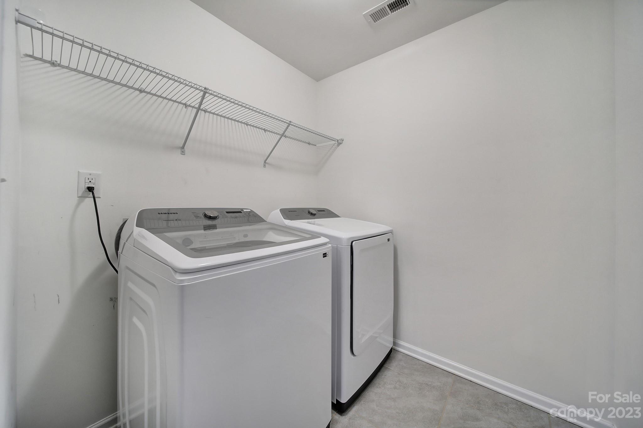5072 Gribble Lane Lancaster, SC 29720 - Photo 16 of 34 a utility room with dryer and washer