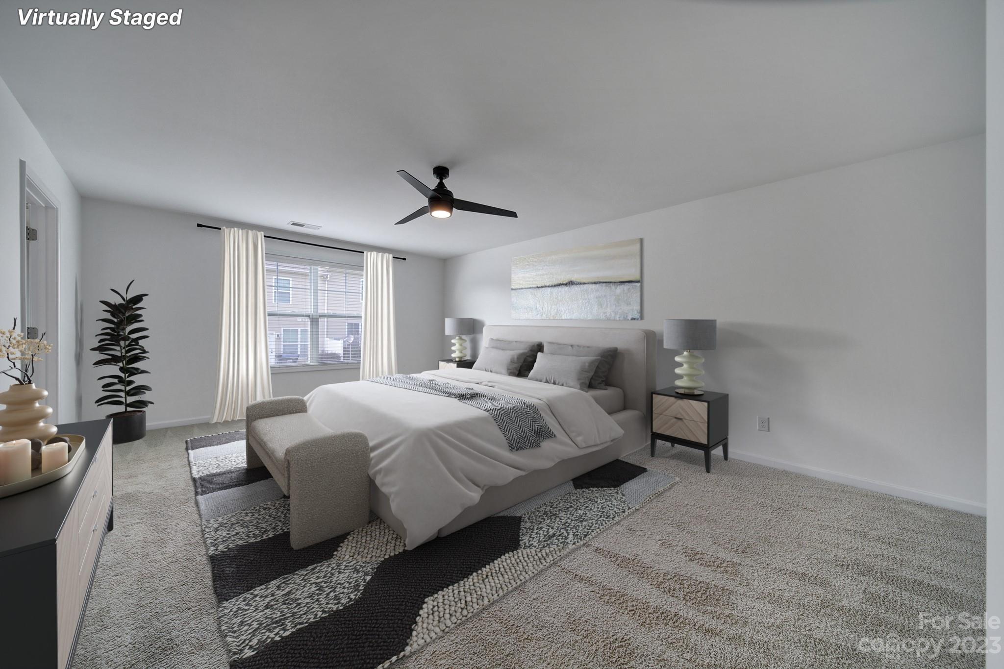 5072 Gribble Lane Lancaster, SC 29720 - Photo 20 of 34 a bedroom with a bed and flowerpot