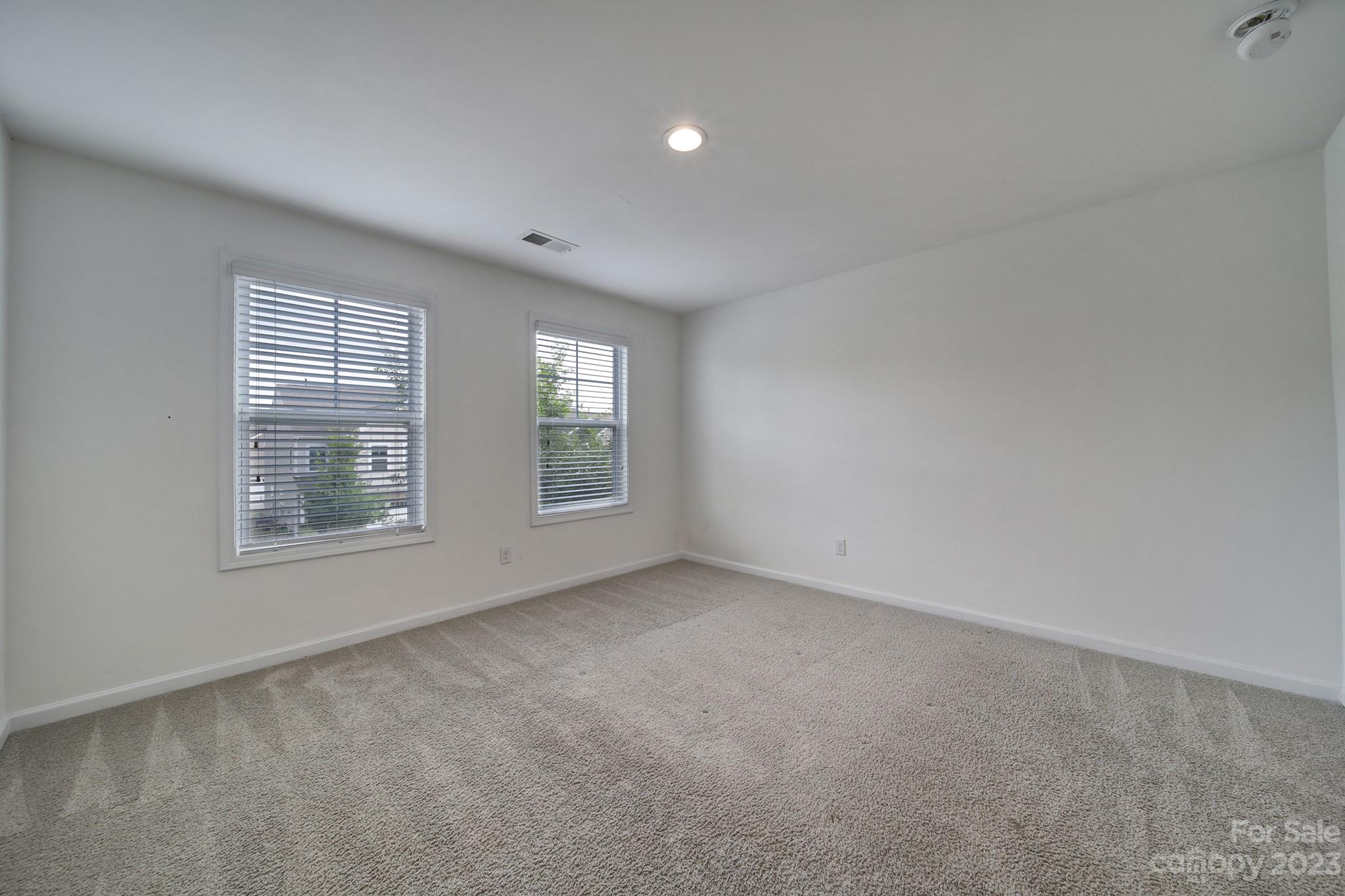 5072 Gribble Lane Lancaster, SC 29720 - Photo 22 of 34 an empty room with windows