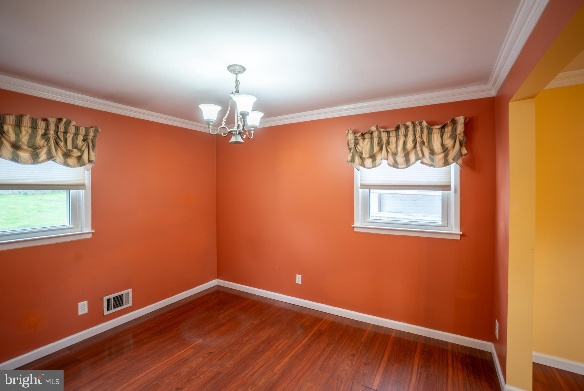 32 Coleridge Avenue Hamilton, NJ 08620 - Photo 11 of 22 en empty room with window wooden floor and fan
