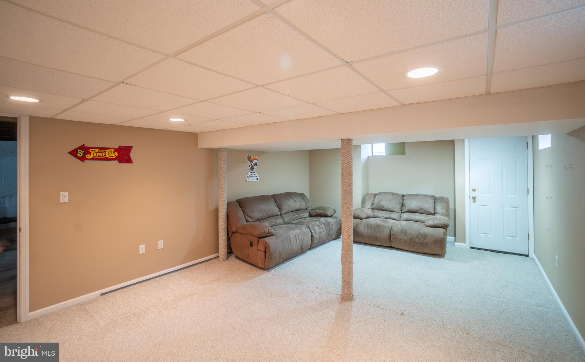 32 Coleridge Avenue Hamilton, NJ 08620 - Photo 18 of 22 a living room with furniture and a couch