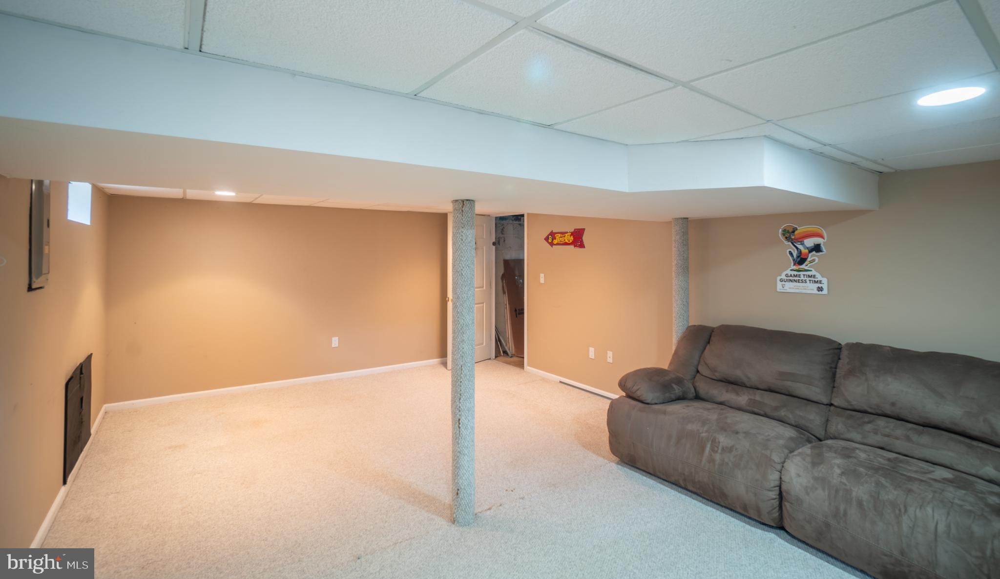 32 Coleridge Avenue Hamilton, NJ 08620 - Photo 19 of 22 a living room with furniture and a ceiling fan
