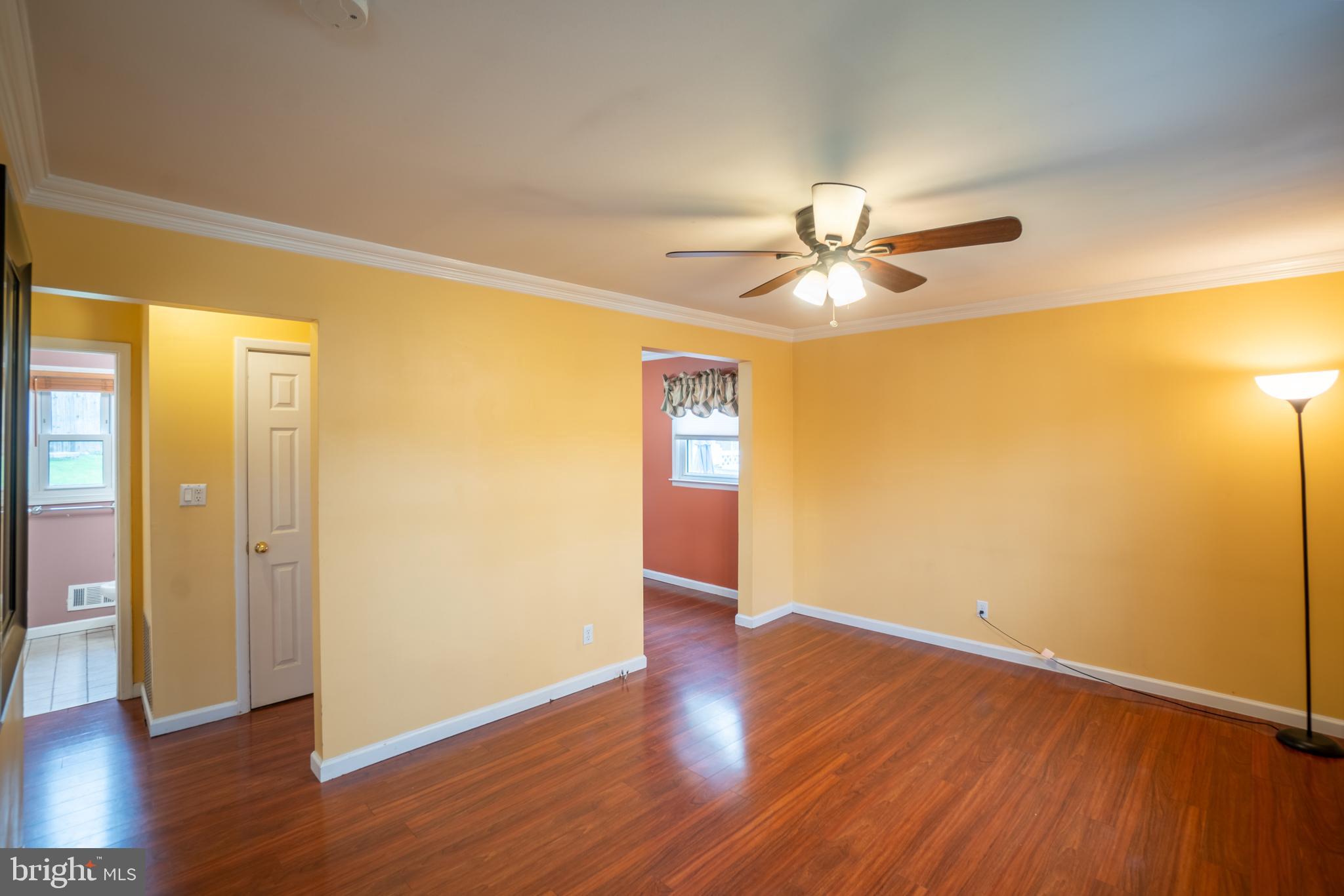 32 Coleridge Avenue Hamilton, NJ 08620 - Photo 2 of 22 a view of an empty room with window and wooden floor