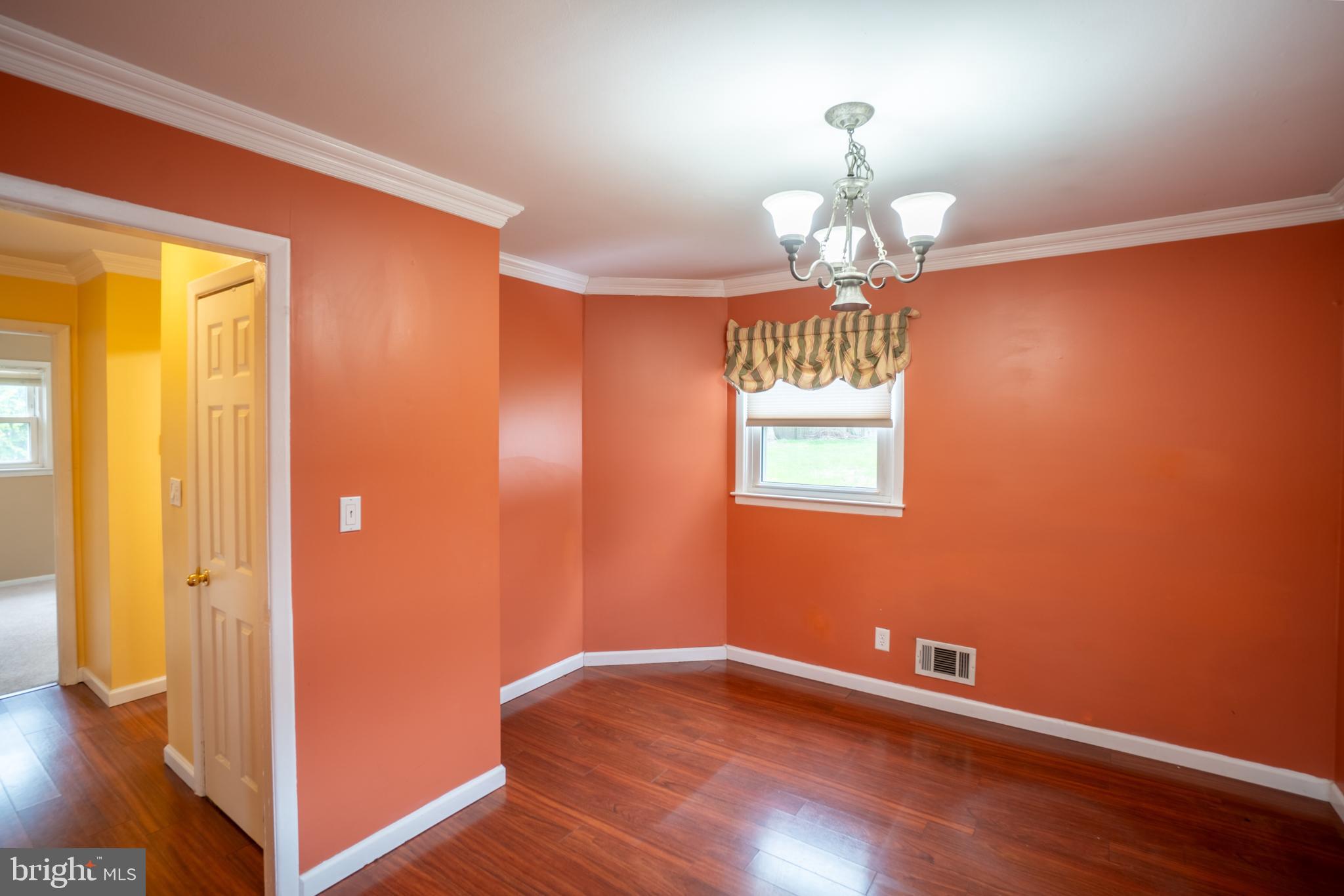 32 Coleridge Avenue Hamilton, NJ 08620 - Photo 8 of 22 a view of a livingroom with a chandelier
