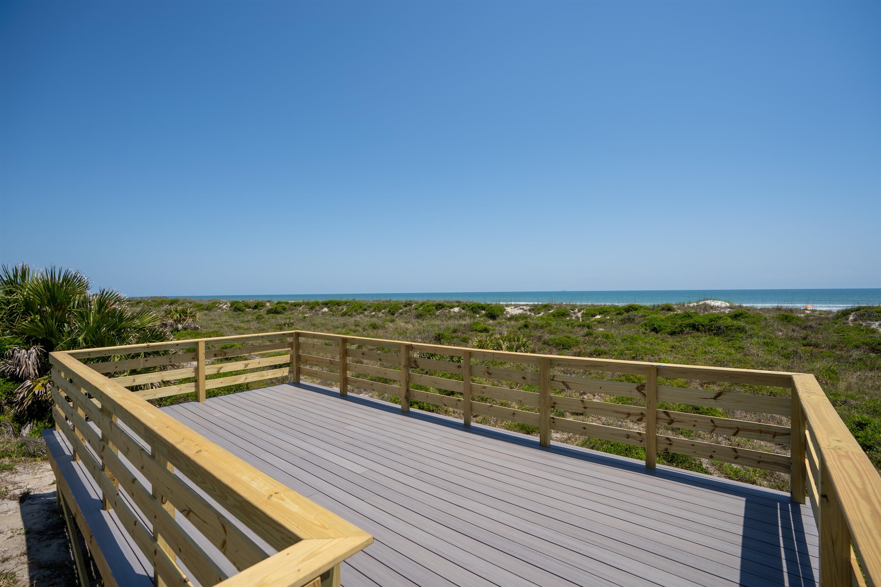 5650 A1A South, Unit C218 St. Augustine, FL 32080 - Photo 49 of 77 a view of outdoor space with wooden floor and tennis court