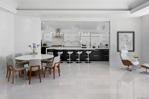 a kitchen with a table and chairs in it