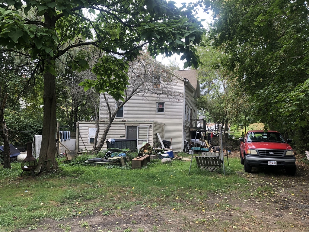 96 Cherry Street Whitman, MA 02382 - Photo 4 of 6 a view of a park with large trees