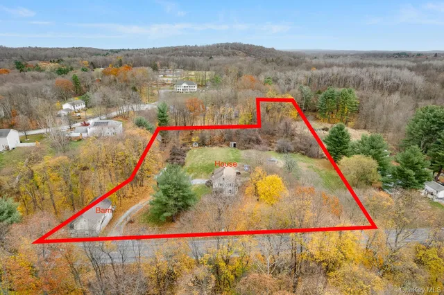 a view of swimming pool with a lake view