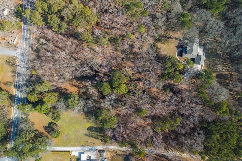 3311 Clay Road Southwest Austell, GA 30106 - Photo 16 of 16 a view of a lake with large trees