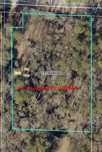 3311 Clay Road Southwest Austell, GA 30106 - Photo 2 of 16 a view of a wooden house with a yard