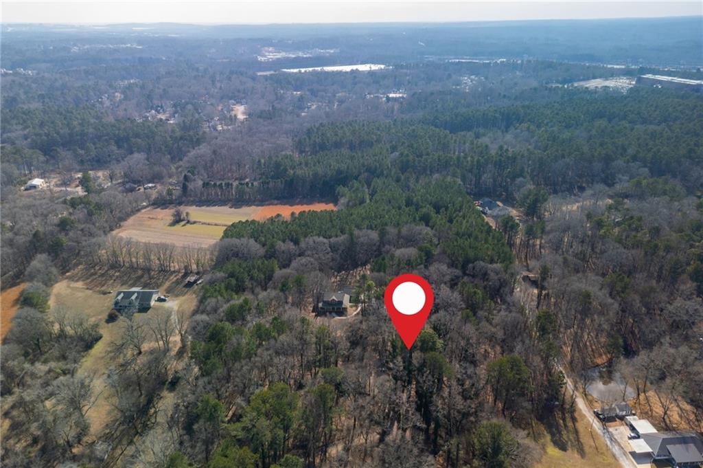 3311 Clay Road Southwest Austell, GA 30106 - Photo 6 of 16 a view of a forest with a yard