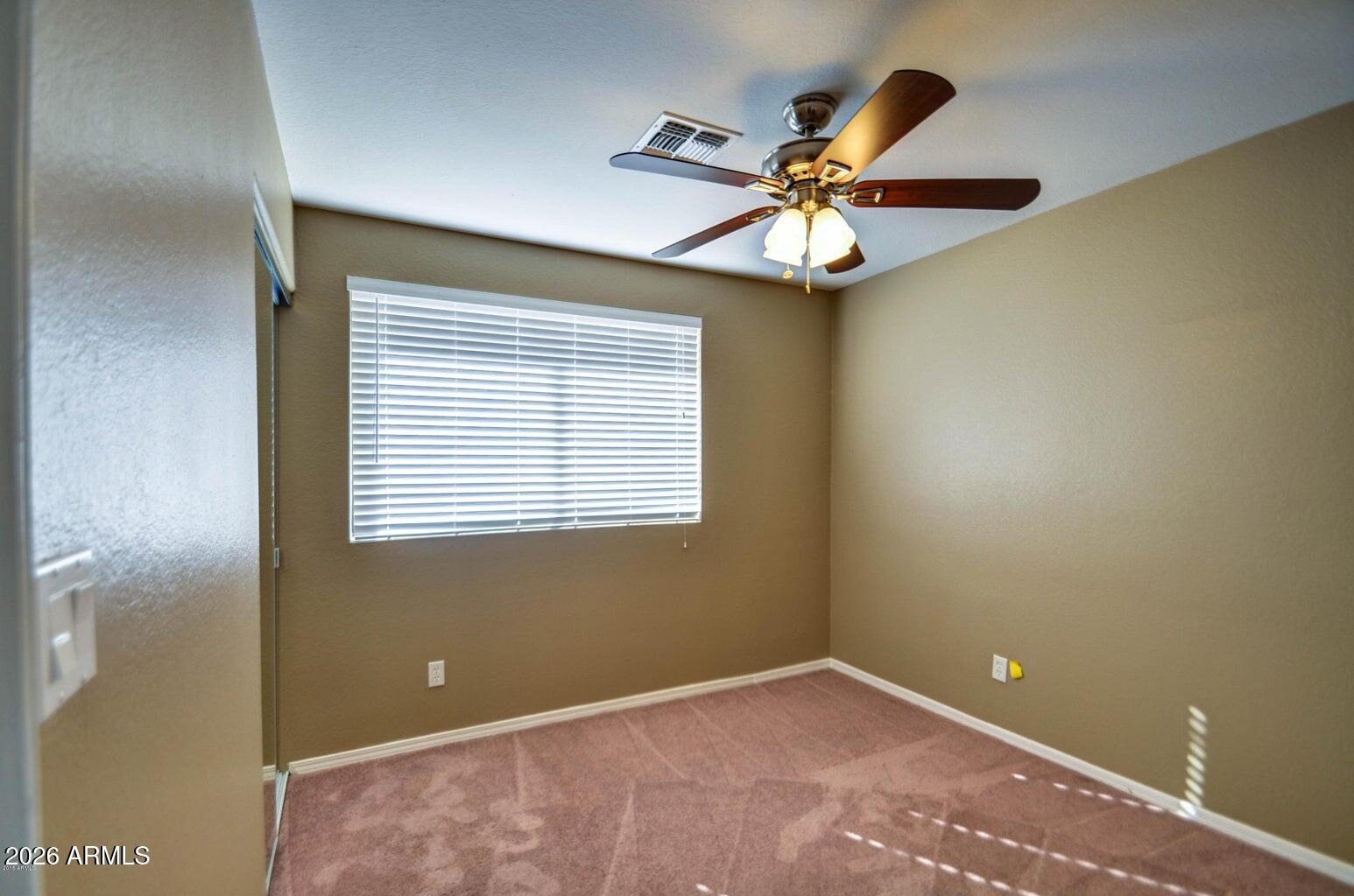 3022 North 34th Place Phoenix, AZ 85018 - Photo 23 of 40 a view of an empty room with a window