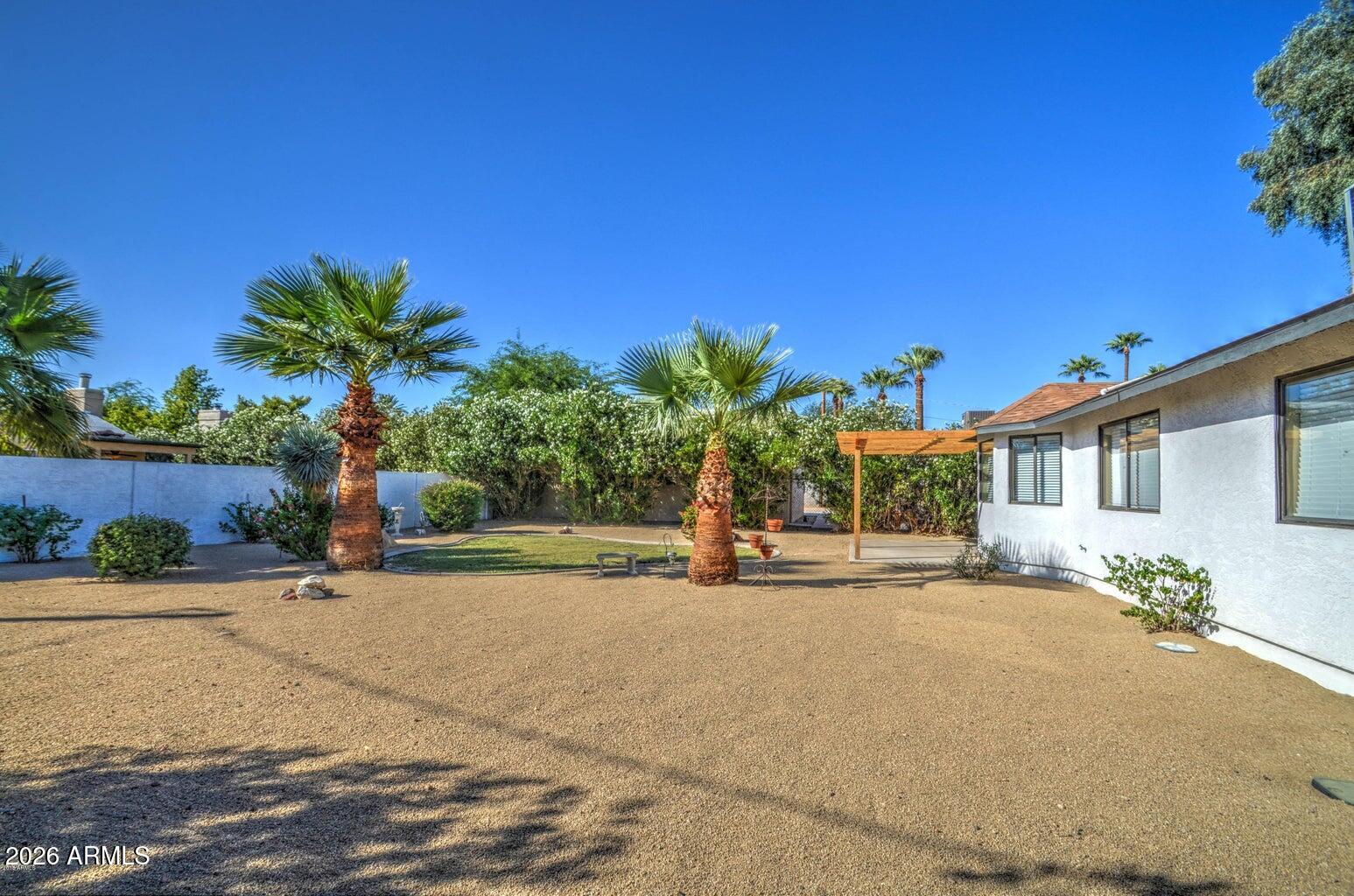 3022 North 34th Place Phoenix, AZ 85018 - Photo 39 of 40 a blue sign that is sitting in front of a house