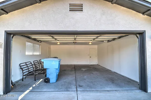 a view of entryway and cabinet