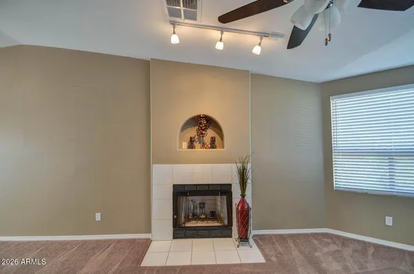 a living room with a fireplace