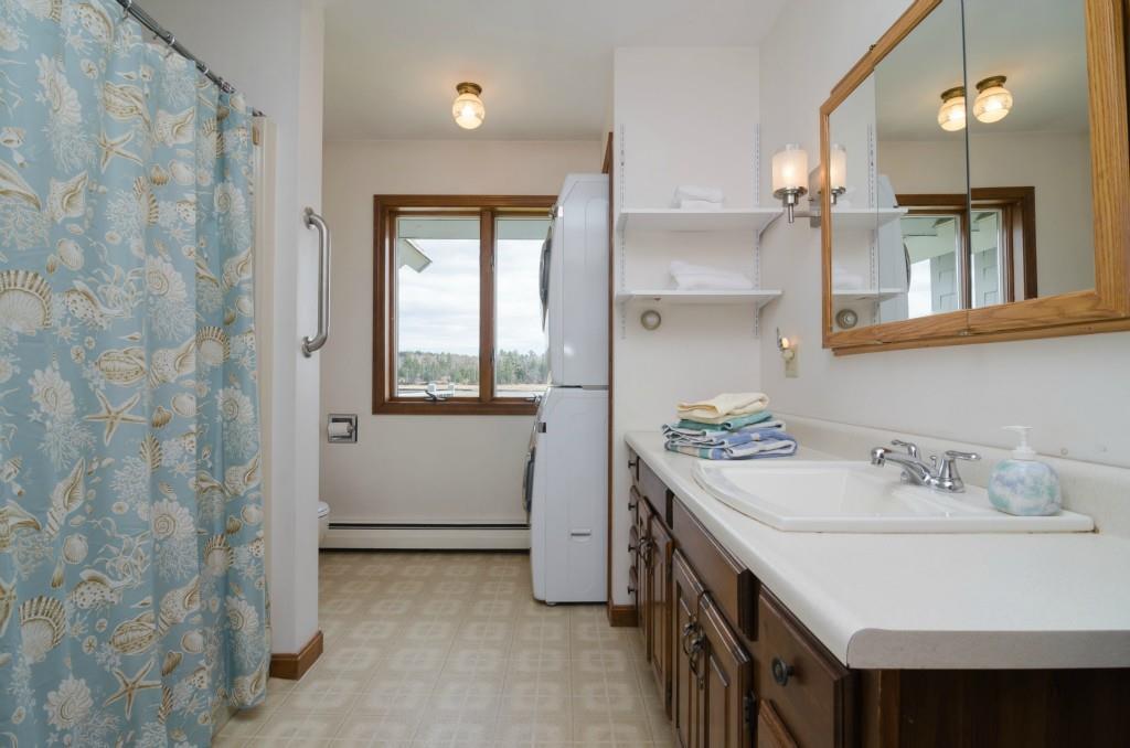 163 Spurwink Road Scarborough, ME 04074 - Photo 21 of 35 Bathroom with laundry