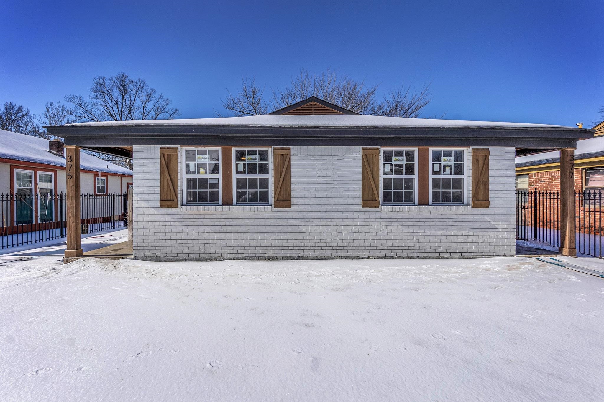 375 Pope Street Memphis, TN 38112 - Photo 1 of 19 View of side of home featuring brick siding