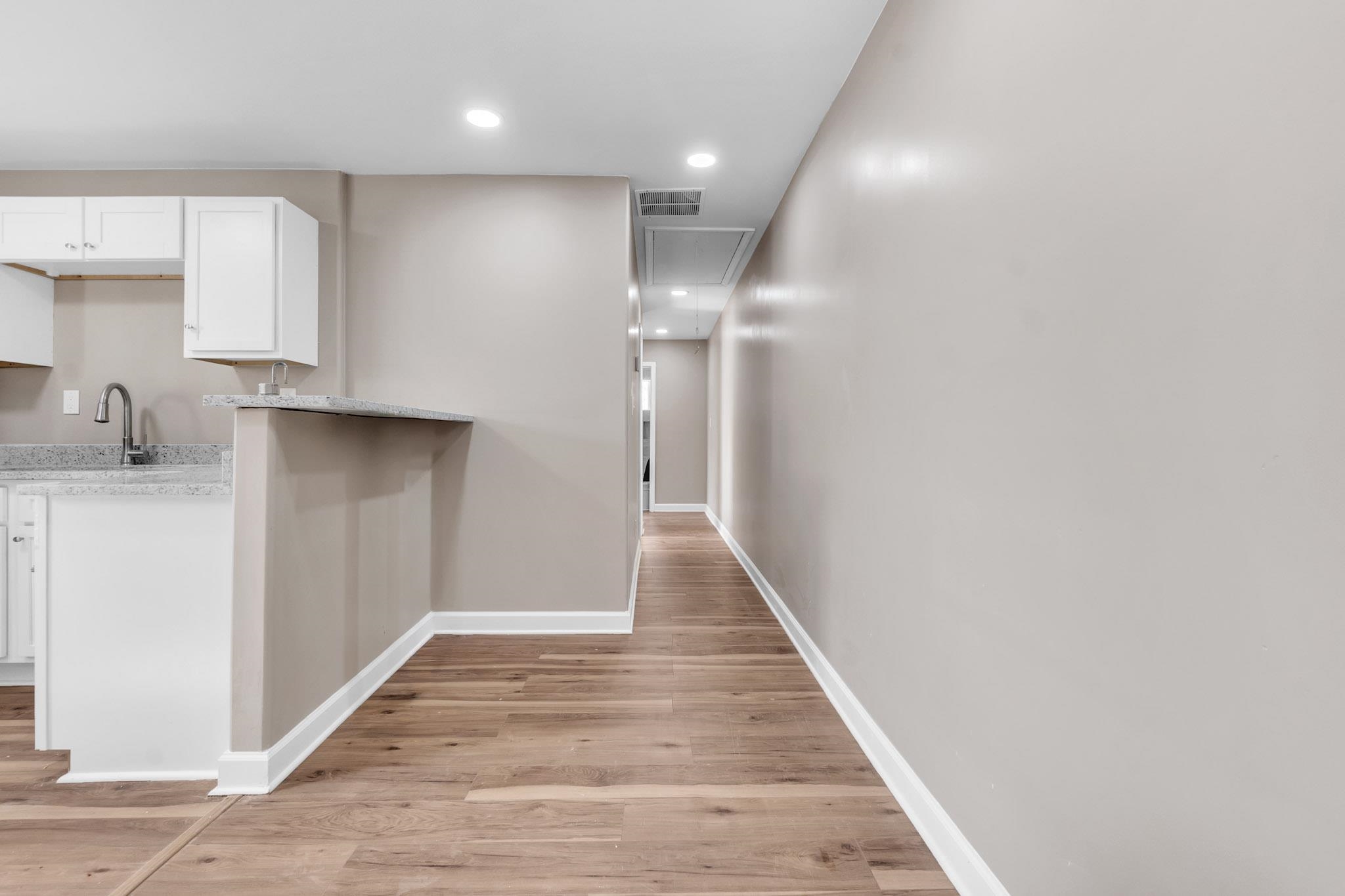 375 Pope Street Memphis, TN 38112 - Photo 11 of 19 Hall featuring recessed lighting and light wood-type flooring